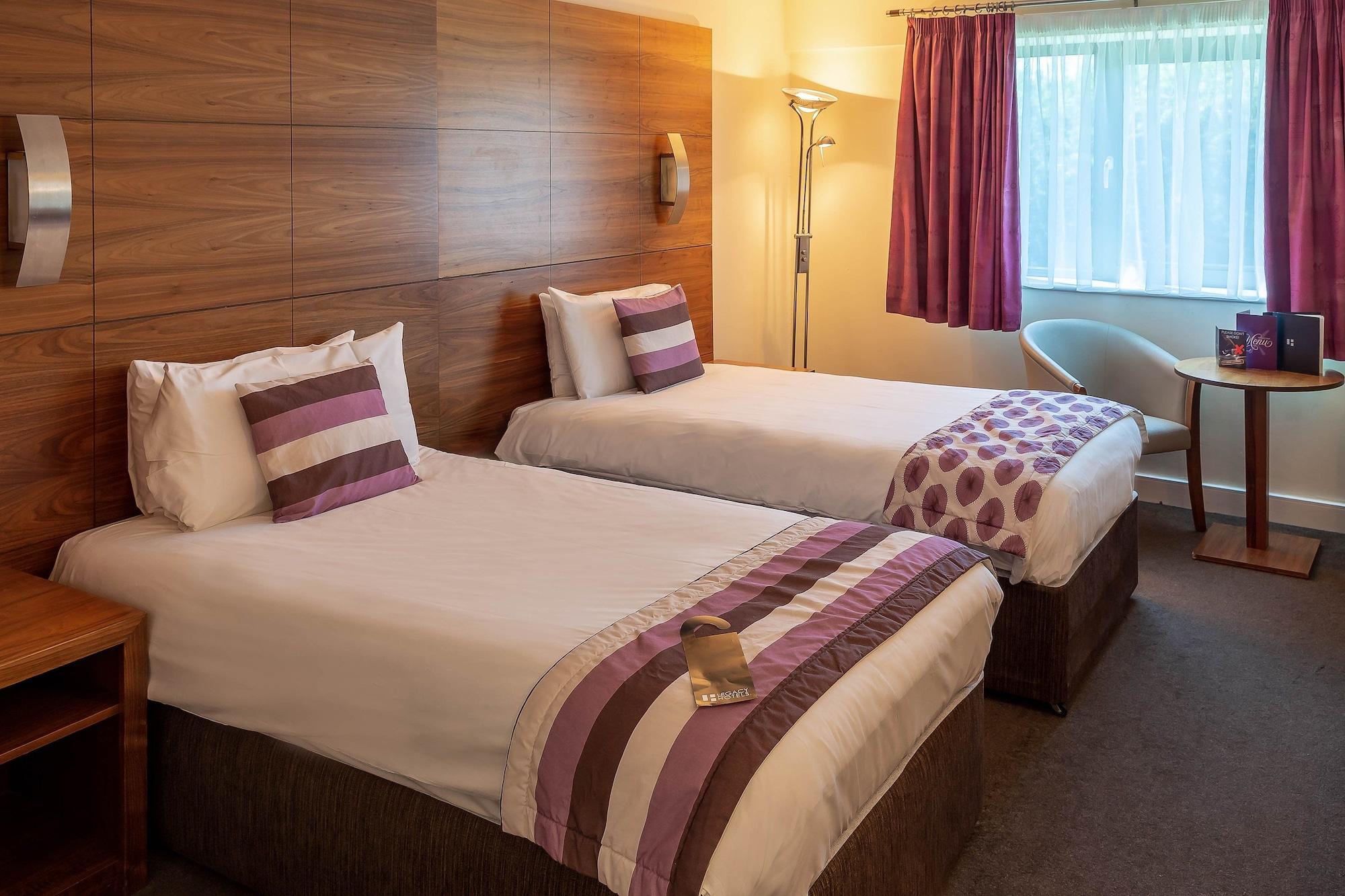 Legacy Preston International Hotel Bagian luar foto